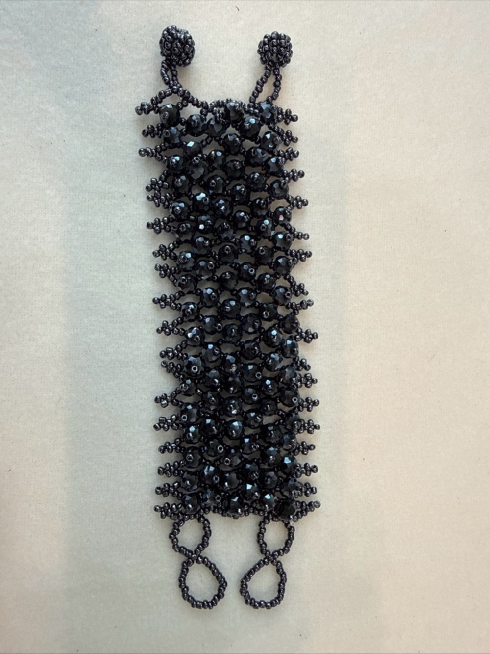 Black Beaded Statement Bracelet with Shimmering Faceted Beads
